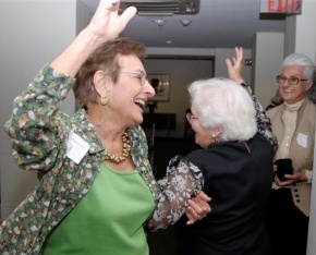 Women dancing & laughing - Photo by Mimi Katz